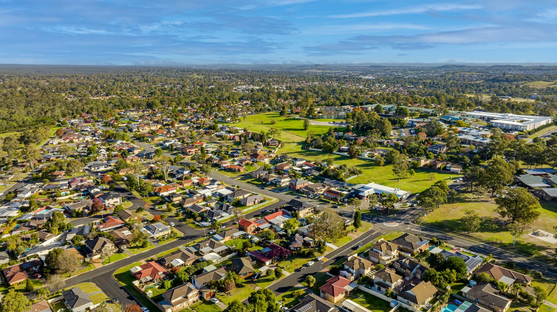 Aerial photograph of an established Sydney residential neighbourhood and parkland